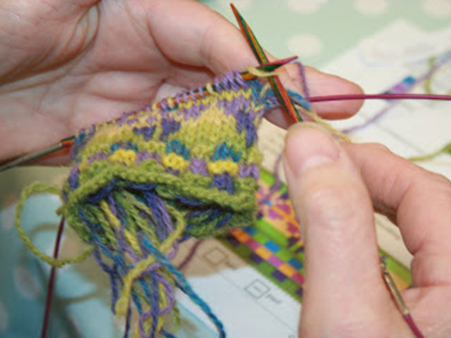 A flowery purse is started