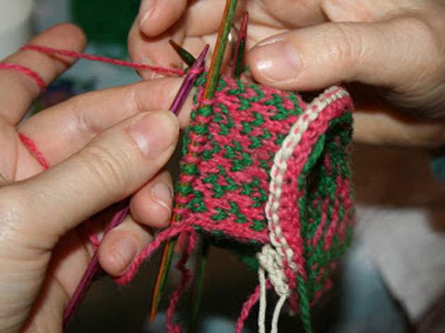 A pincushion emerges