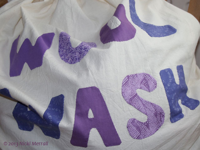 Wool wash bag - applique detail