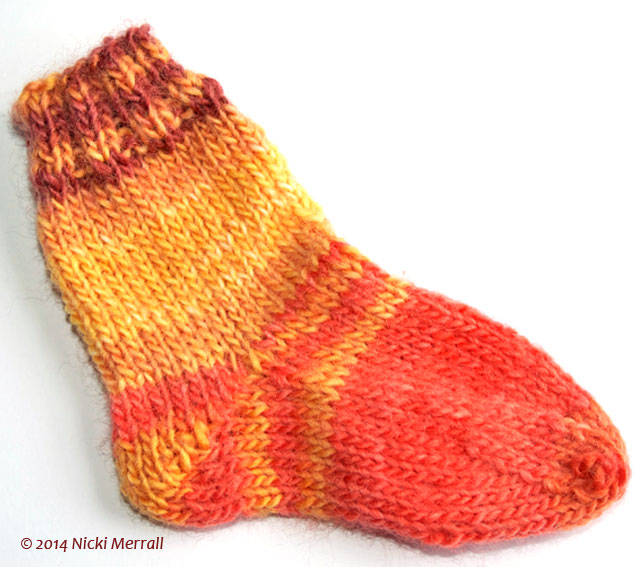 Top-down sock with short-row heel and wedge toe