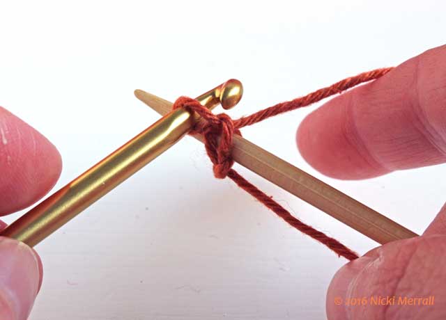 Pull yarn through loop on hook