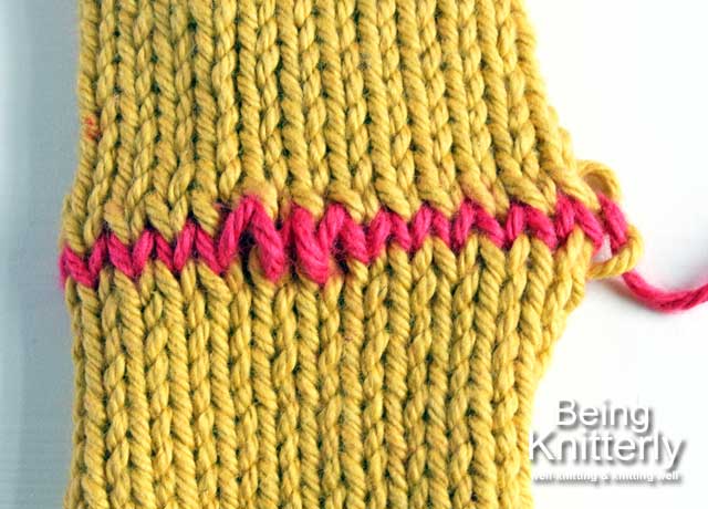 Step 16: Use yarn needle to ease yarn along row so tension of sewn stitches matches that of knitted stitches